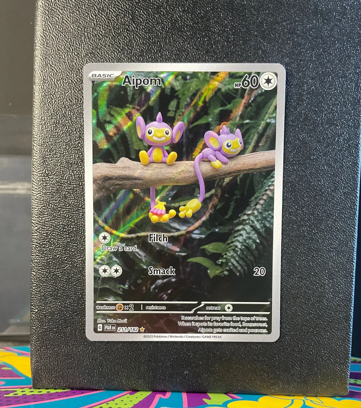 Aipom 211/182 - Frente