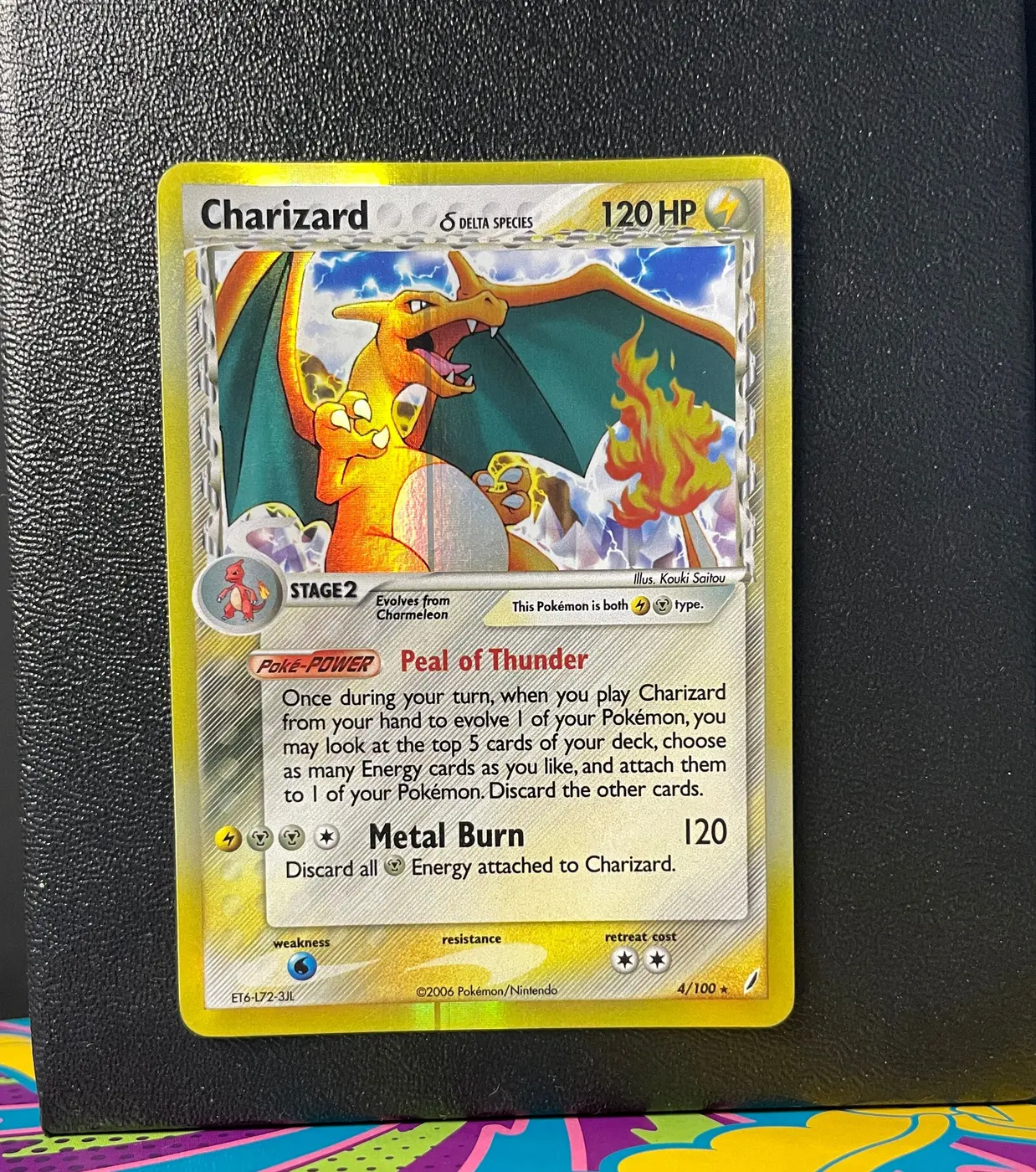 Charizard δ 4/100 - Frente