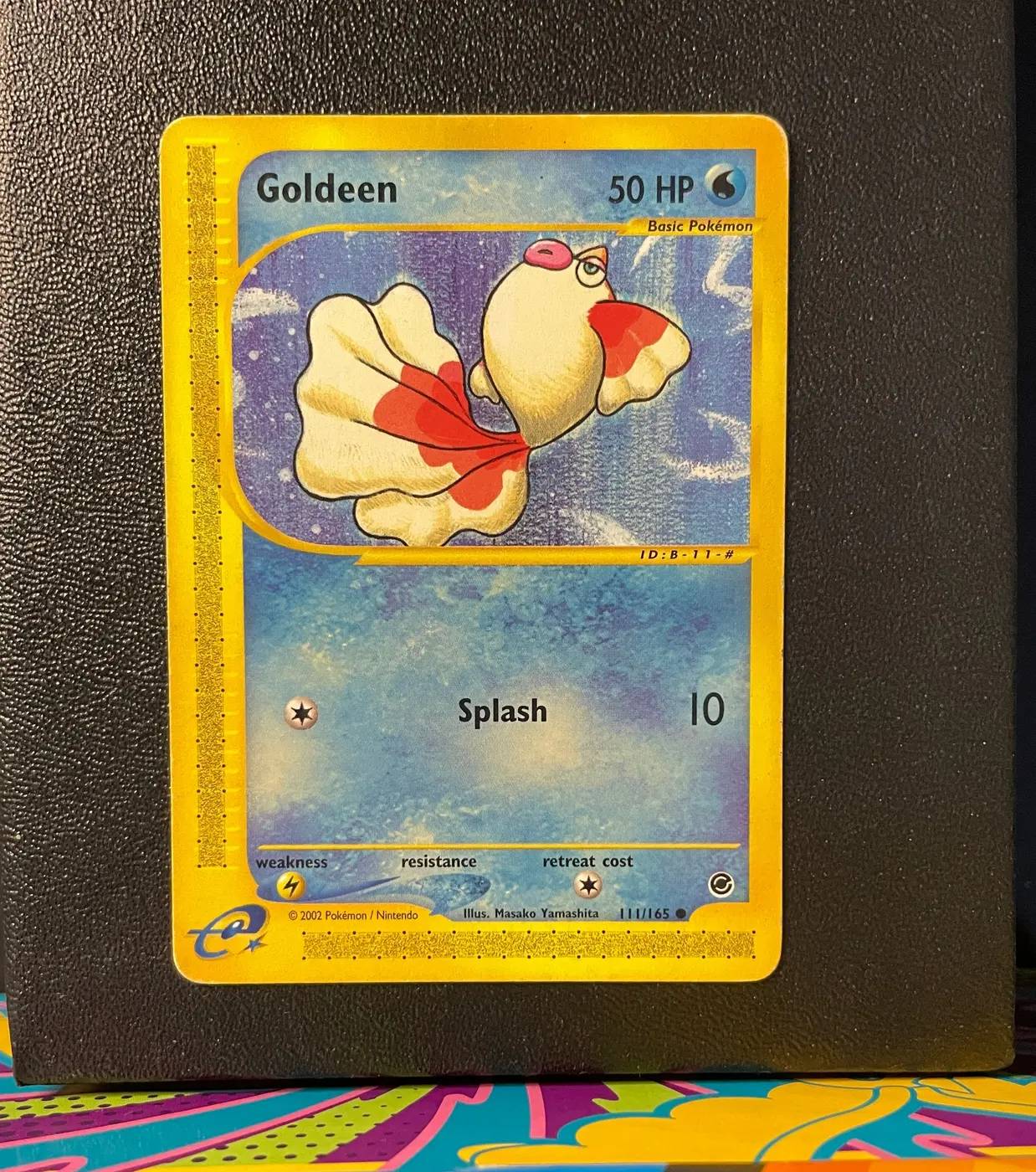 Goldeen 111/165 - Frente
