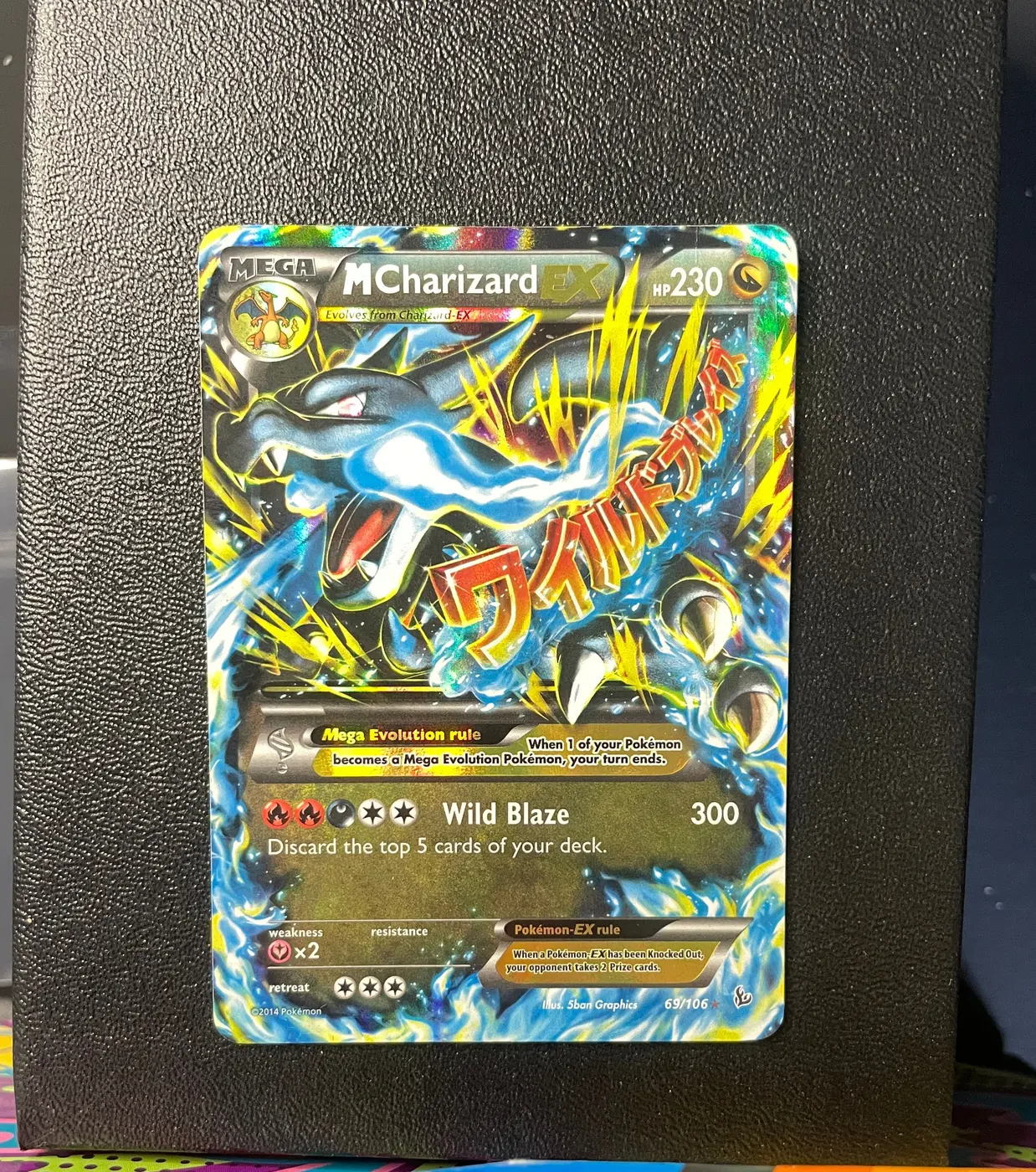 M Charizard EX 69/106 - Frente