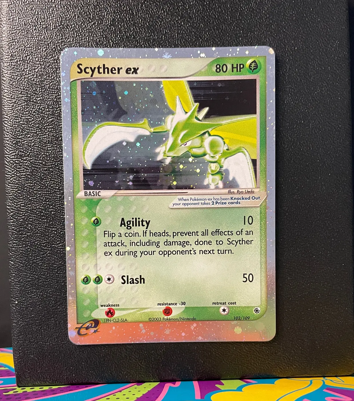 Scyther ex 102/109 - Frente