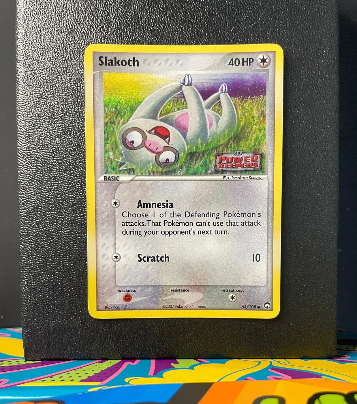 Slakoth 63/108 - Frente